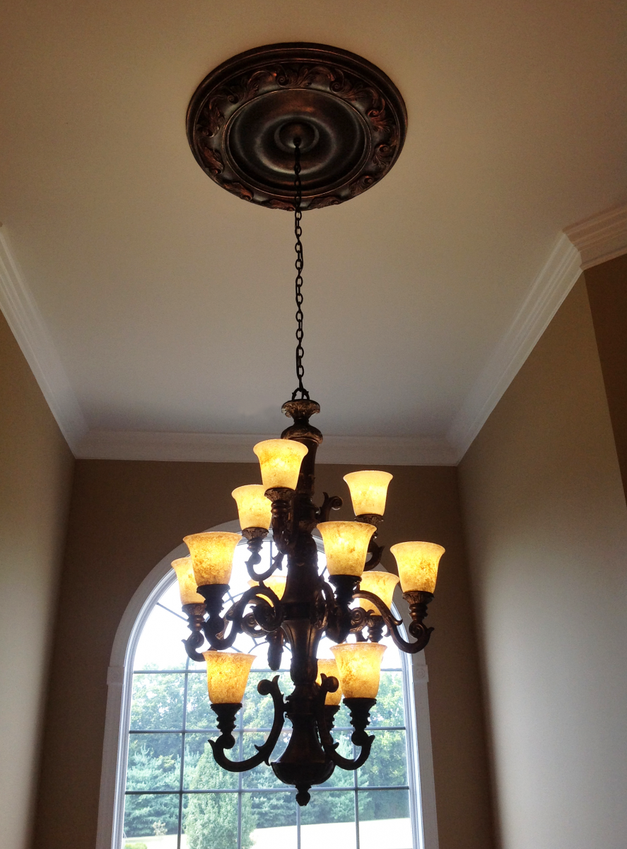 Because of our makeover this client no longer had to purchase a new chandelier  - we saved them thousands.