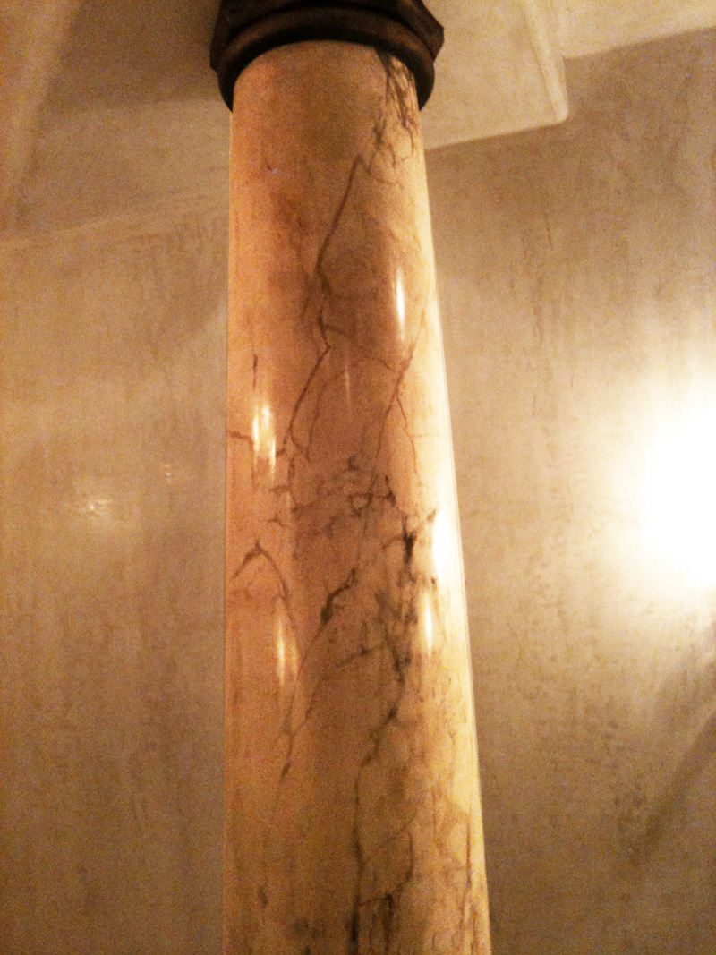Master bathroom enhancements – this faux marble column with iron/bronze capital and base was paired with this faux pitted plastered technique on walls to achieve that authentic limestone look.