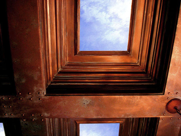 Faux iron and copper coffer ceiling with sky mural.