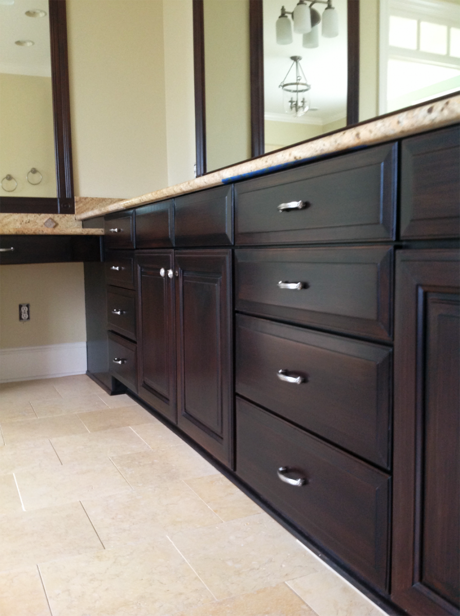 Enjoy this Brentwood, TN client's master bathroom cabinet makeover in faux wood Mahogany glaze finish. Beautiful!