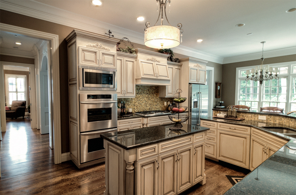 Beautiful Italian hand –rubbed toning and accent glaze on kitchen cabinet.