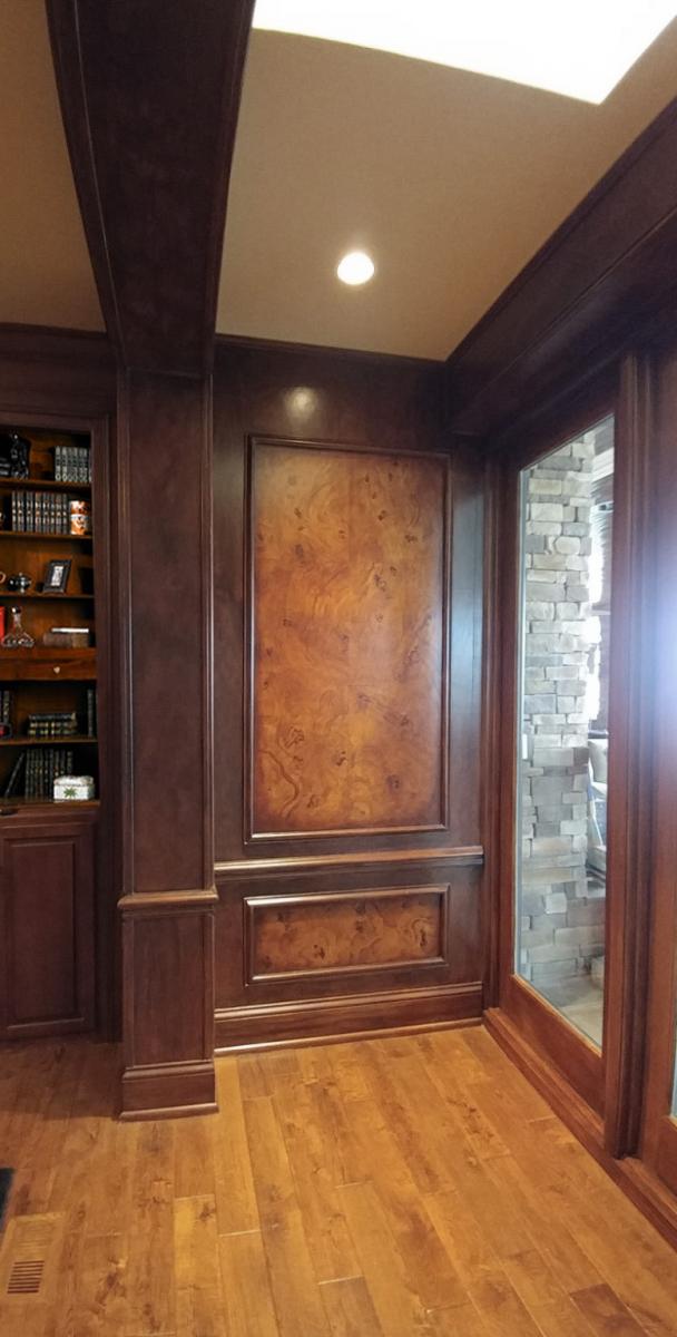 faux burl and wood grained panels and mahogany wood grained walls