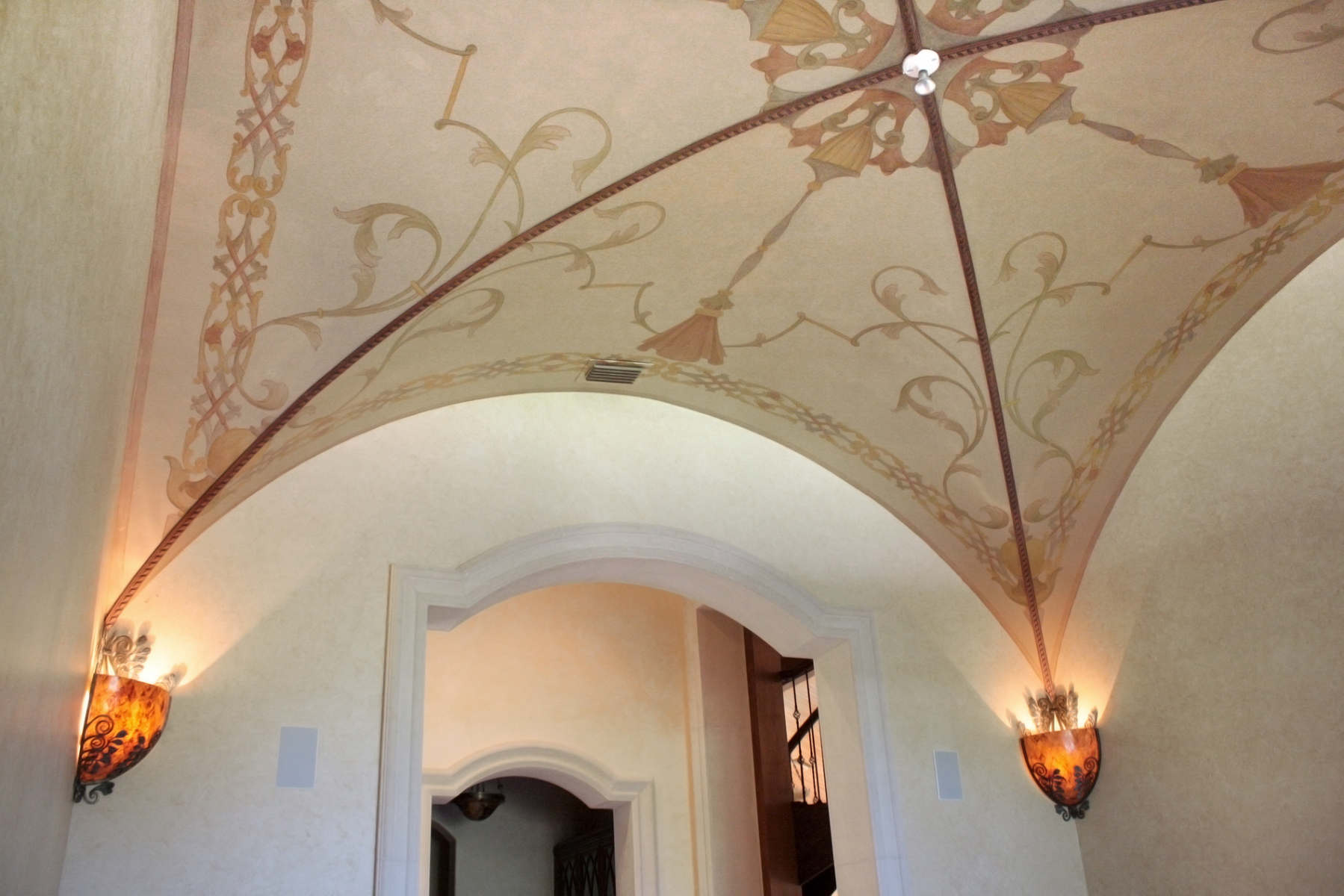 Hand enhanced stencil ceiling designs.
