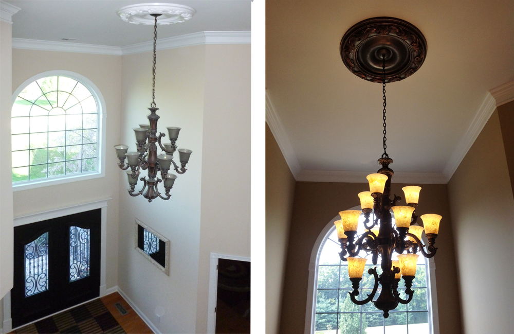 Faux bronze chandelier and medallion makeover, including the changing of dreary gray glass shades into beautifully glowing globes.