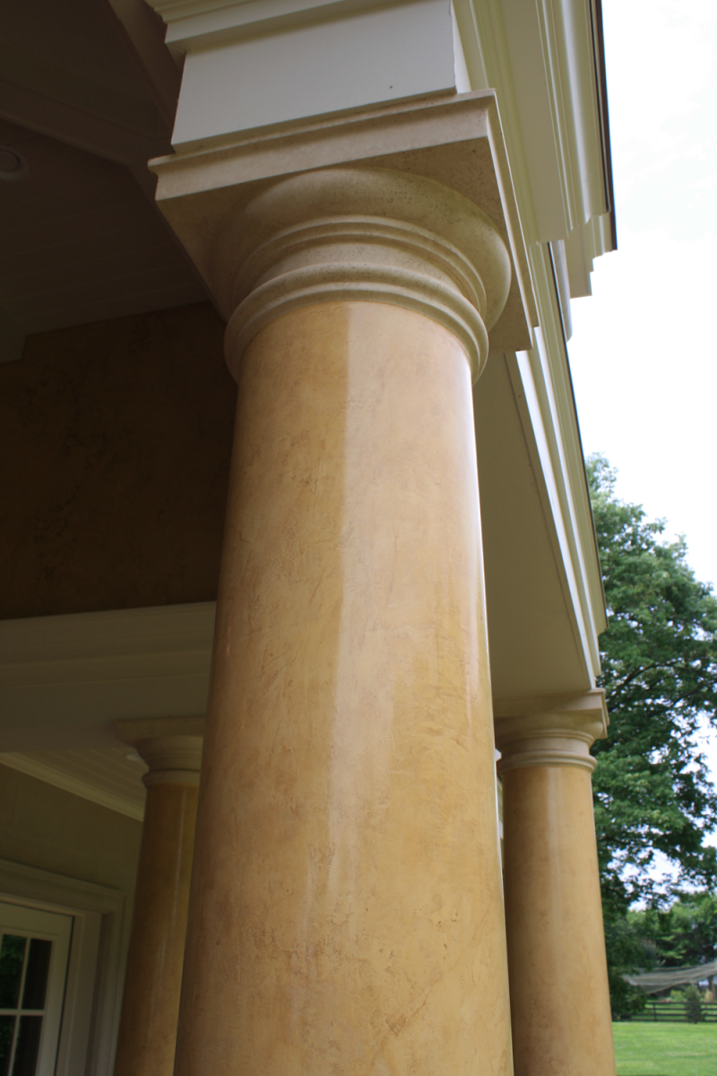 Venetian plaster columns faux sandstone tops