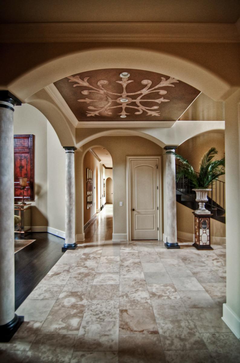 Metallic and stone ceiling design with custom-made stencil.