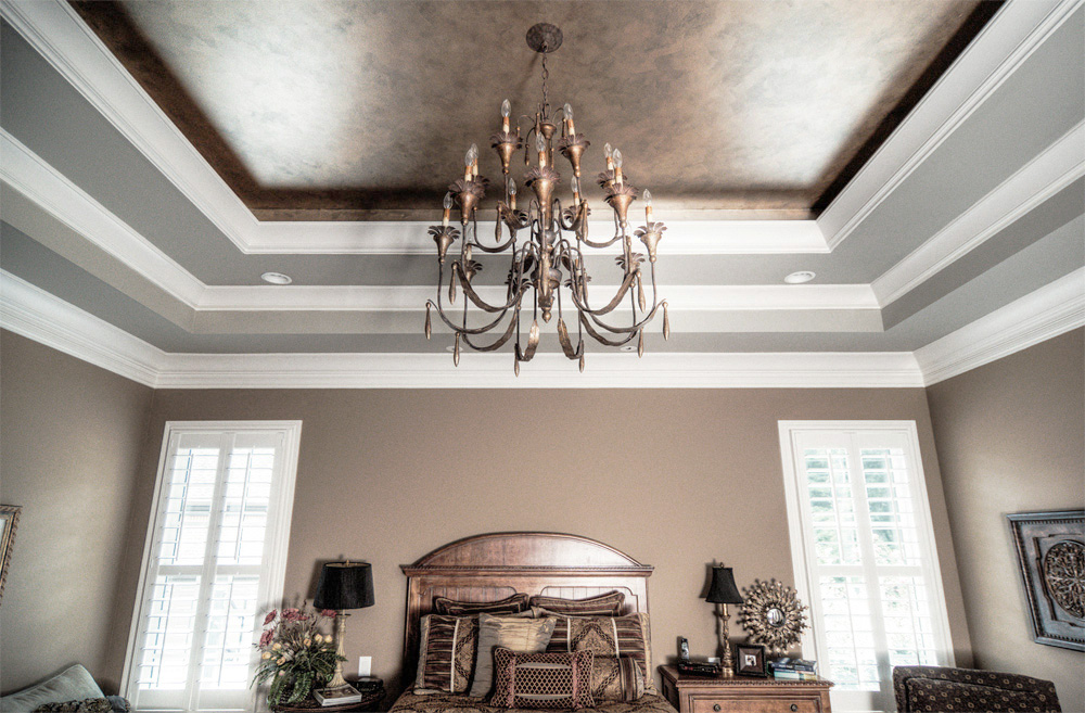 Custom paint and faux metal tray ceiling.