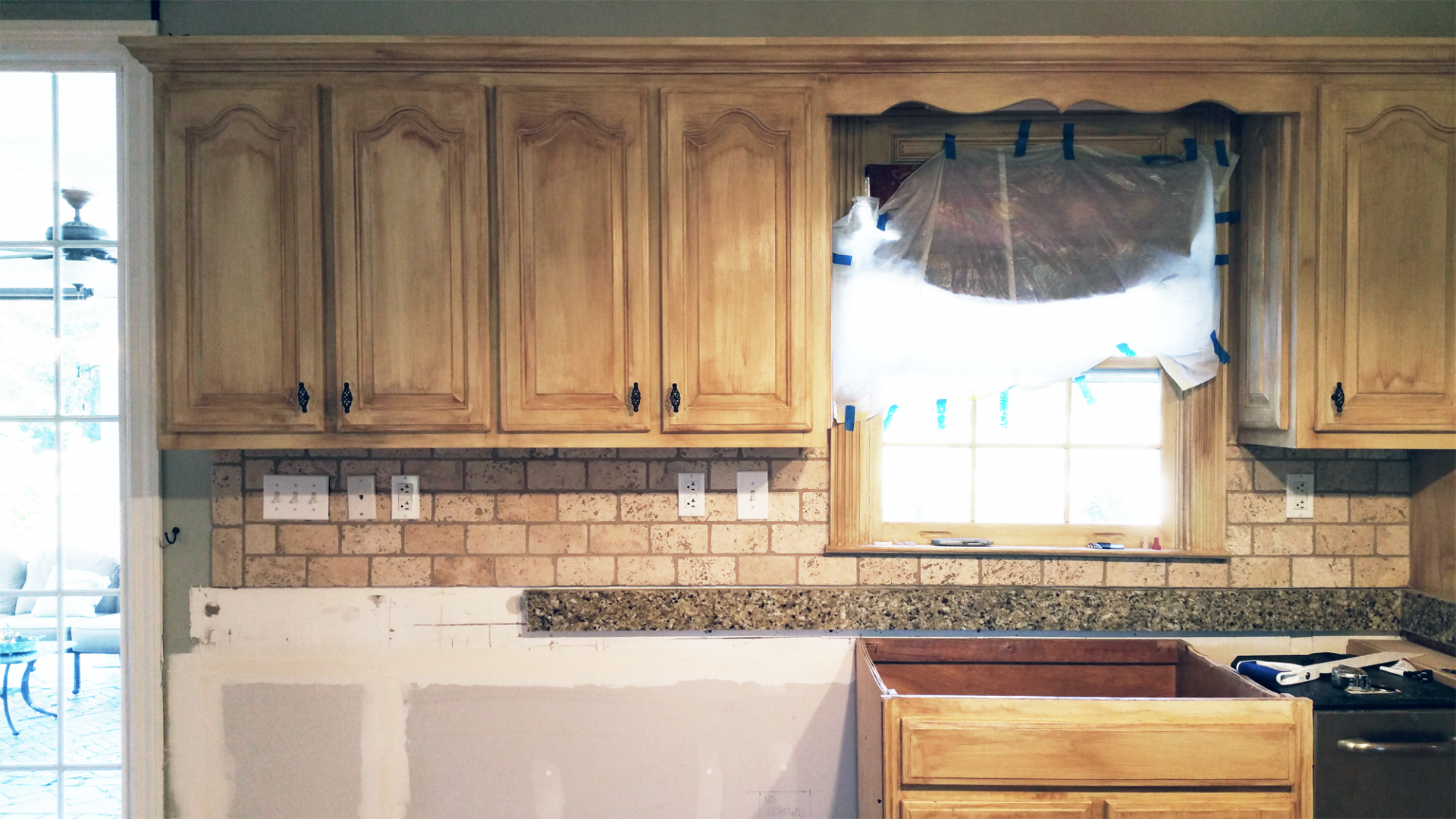 View this Mount Juliet customer’s kitchen cabinets before transformation adding a warm modern Tuscan glaze look.