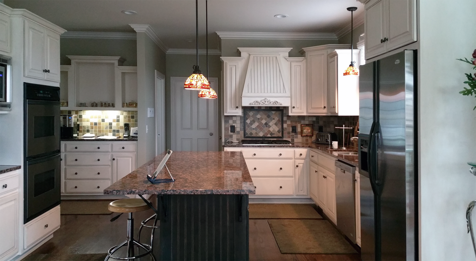 View this After Brentwood customer’s kitchen cabinet transformation adding a warm modern Tuscan glaze look.