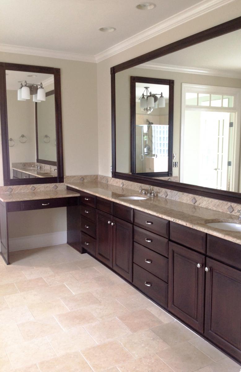 Faux mahogany wood glaze cabinet makeover for this Brentwood, TN client’s Master bathroom. Beautiful!