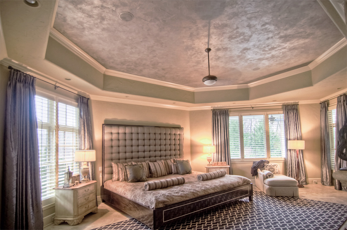 After – This shimmering metallic ceiling is a perfect color and design complement for this rooms glistening silk drapery.
