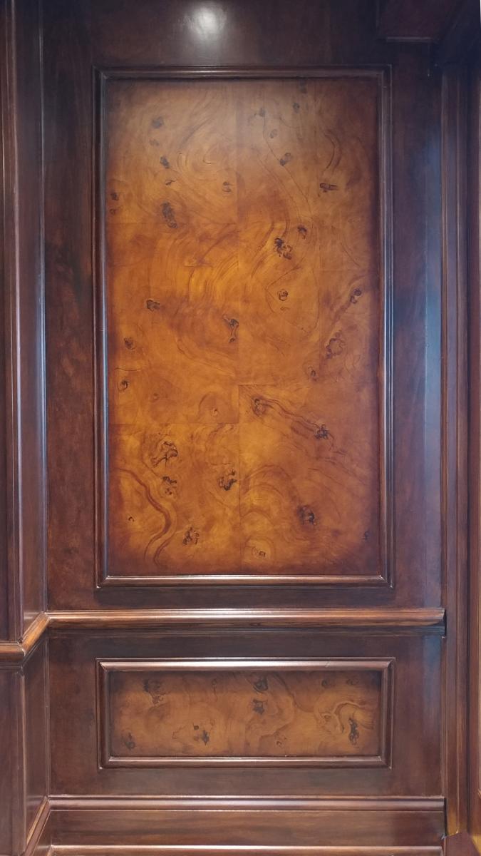 faux burl panels and wood grained walls